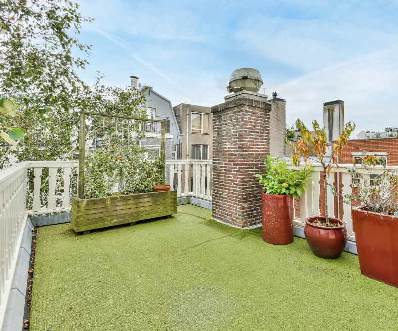 a rooftop with green artificial turf a rooftop with green artificial turf